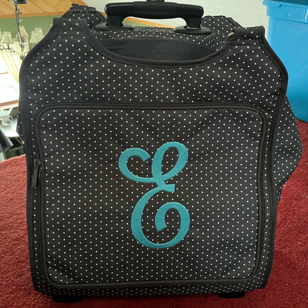 Thirty one brand rolling bag. Never used